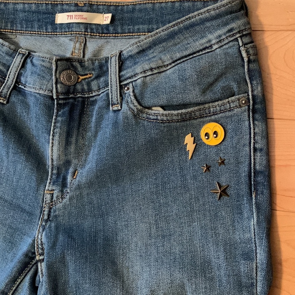 Levi’s 711 Skinny Jeans with Enamel Smiley Face and Stars